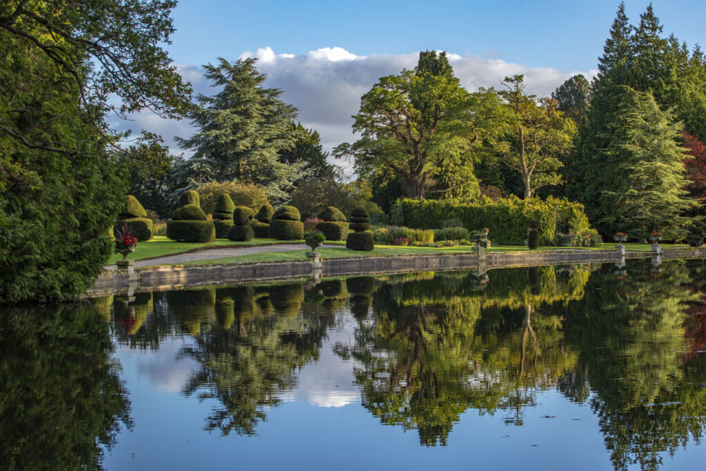 Garden lake reflections at Thorp Perrow, photograph by Clive Nichols